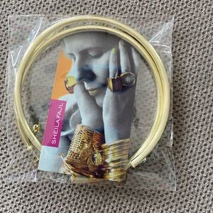 Sheila Fajl “Rihanna” hoop earrings.